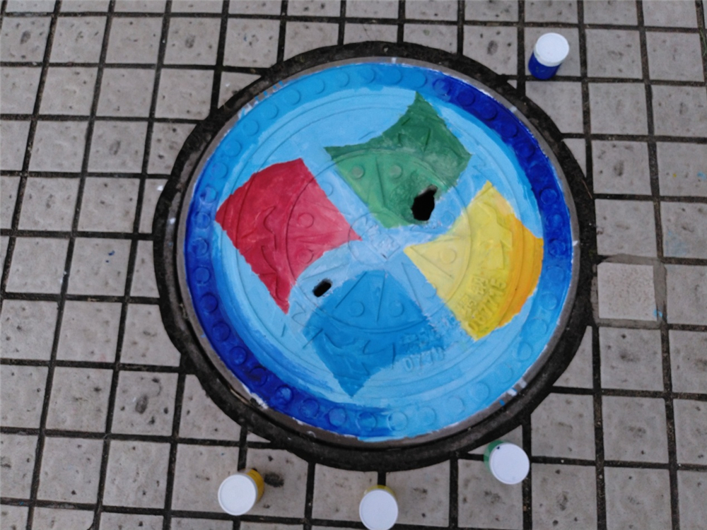 笔墨丹青迎华诞,旧井新颜贺良辰——钦州二中第一届井盖创意绘画比赛成功举办