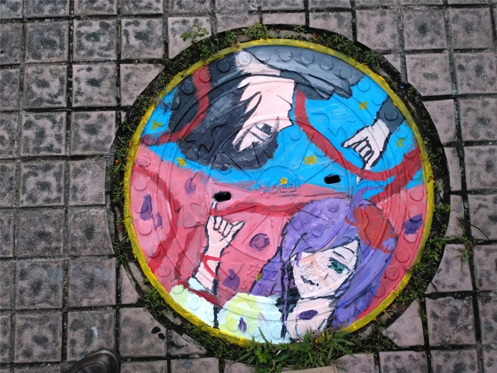 笔墨丹青迎华诞,旧井新颜贺良辰——钦州二中第一届井盖创意绘画比赛成功举办