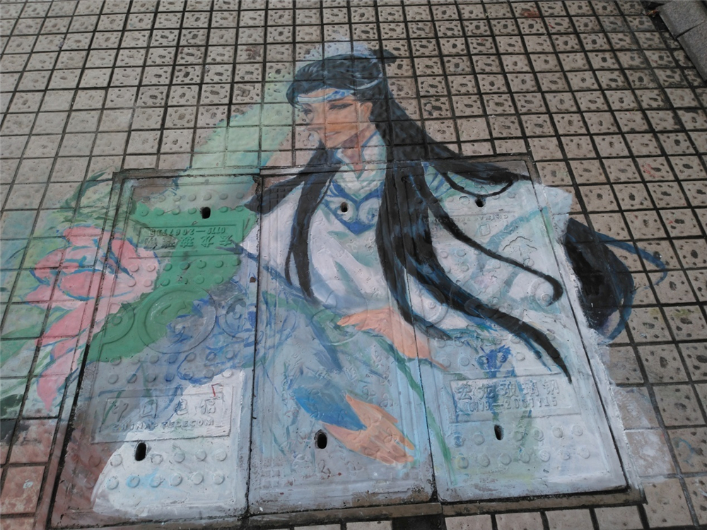 笔墨丹青迎华诞,旧井新颜贺良辰——钦州二中第一届井盖创意绘画比赛成功举办