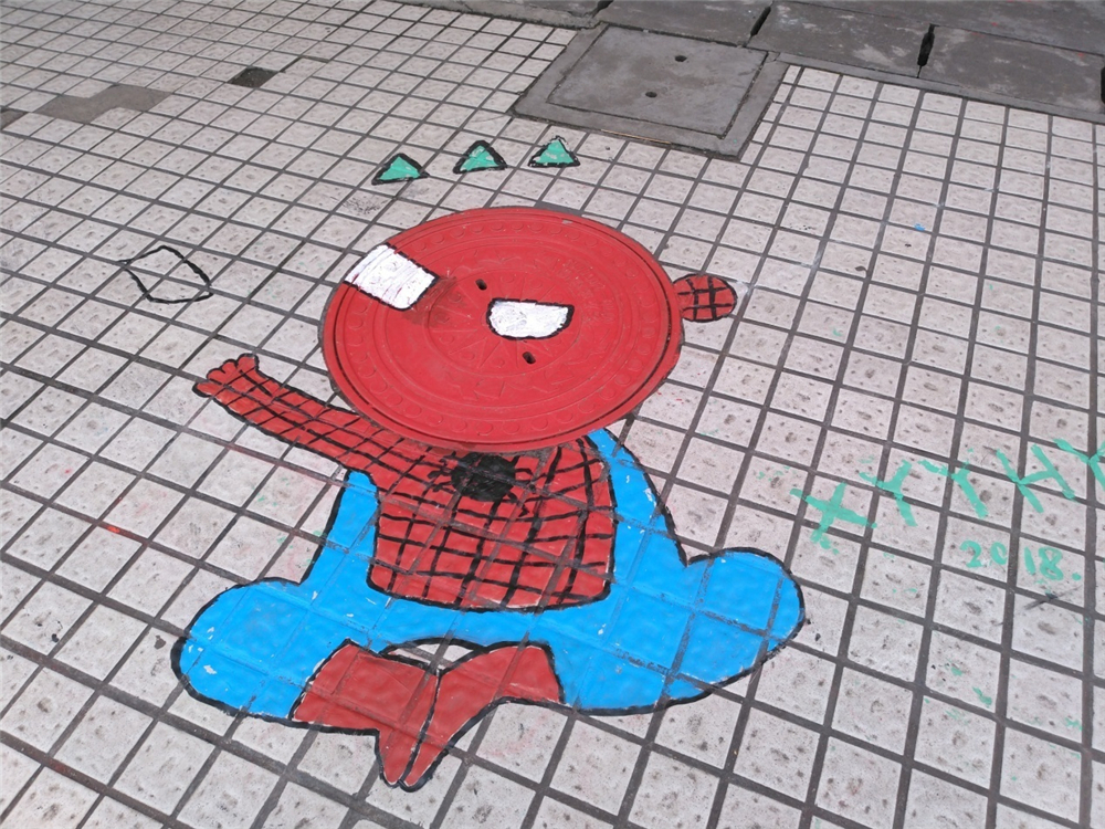 笔墨丹青迎华诞,旧井新颜贺良辰——钦州二中第一届井盖创意绘画比赛成功举办